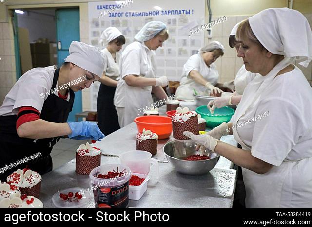 RUSSIA, MAKEYEVKA - APRIL 7, 2023: Employees make Easter cakes at the Mir Khleba bakery. The company plans to produce up to 100 tonnes of Easter cakes