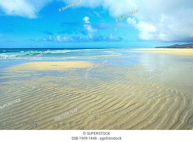 The beach at Costa Calma meets the Atlantic surf and stretches unbroken for 5 miles Fuerteventura Spain Canary Islands Europe