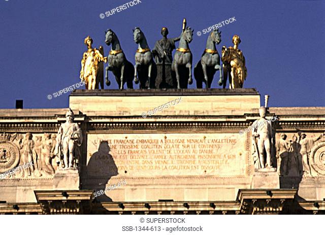 Low angle view of statues, Arc de Triomphe, Paris, France