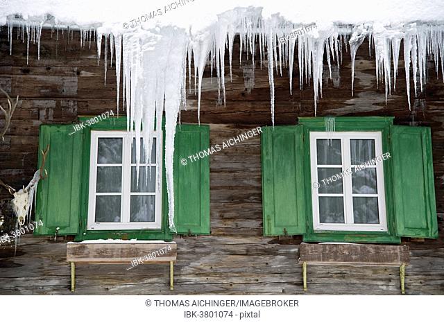 Icicles above the windows of a hunting lodge, Admont, Upper Styria, Styria, Austria