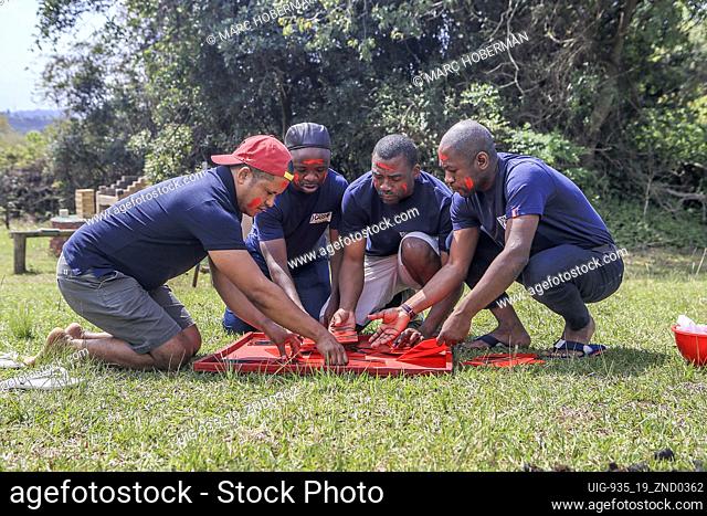 Group of South African men at corporate team building event