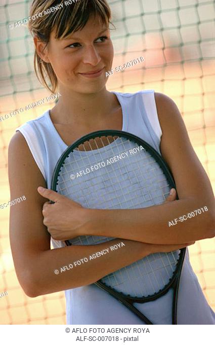 Female Tennis Player Holding Racket