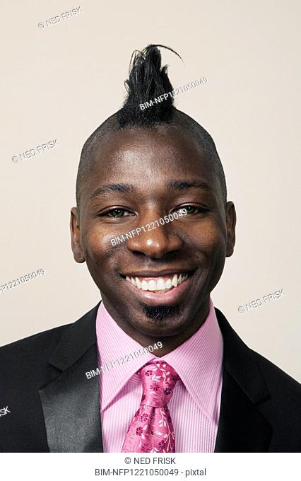 African businessman with mohawk hairstyle