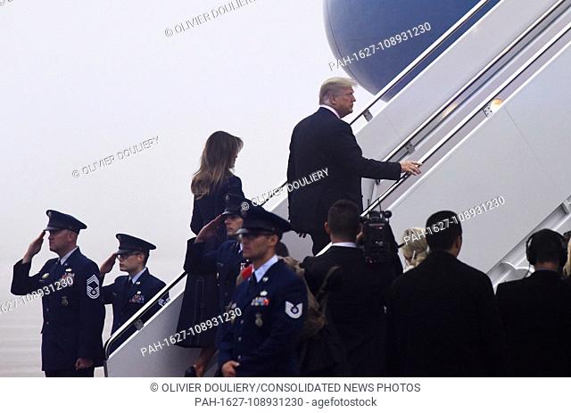 United States President Donald J. Trump and First Lady Melania Trump walk to Air Force one before departing from Joint Base Andrews, Maryland on September 11