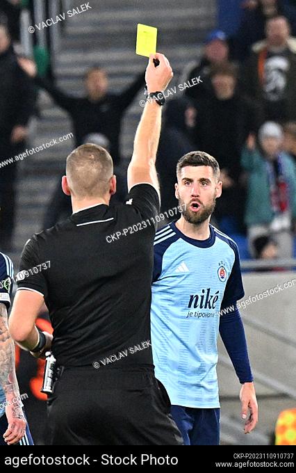 Kenan Bajric of Slovan receives a yellow card during the Football European Conference League 4th round match Slovan Bratislava vs