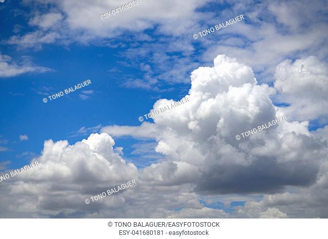 Blue summer sky with cumulus white clouds