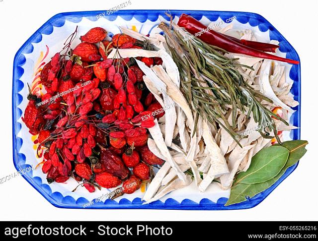 Red autumn dried berries of forest hips, barberry, horseradish and thyme contain a large amount of vitamin C. The fruits are prepared for herbal tea