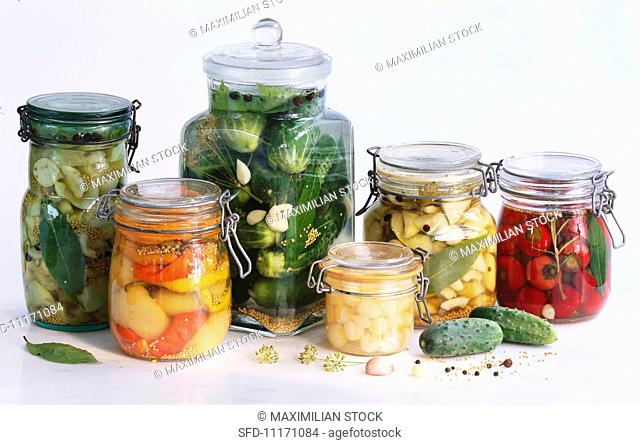 Several jars of pickled vegetables