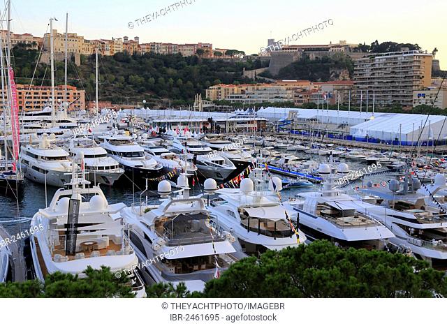 Monaco Yacht Show 2012, Port Hercule in the evening, Prince's Palace at the rear, Principality of Monaco, Cote d'Azur, Mediterranean Sea, Europe