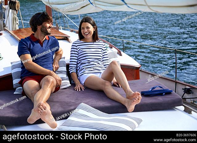 Couple with sailor clothes, Sailboat, Port of Pasaia, Gipuzkoa, Basque Country, Spain, Europe