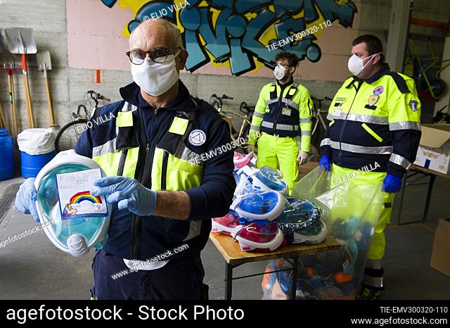 The Civil Protection of Concorezzo during the collection of diving masks EasyBreath that modified will serve hospitals as respirators for Covid-19