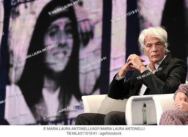 Pietro Orlandi, brother of missing Emanuela Orlandi, behind the photo of Emanuela during the tv show Porta a porta, Rome, ITALY-31-10-2018