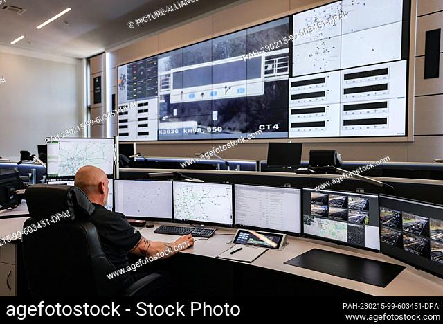 15 February 2023, North Rhine-Westphalia, Leverkusen: An employee sits in the control room of the traffic control center