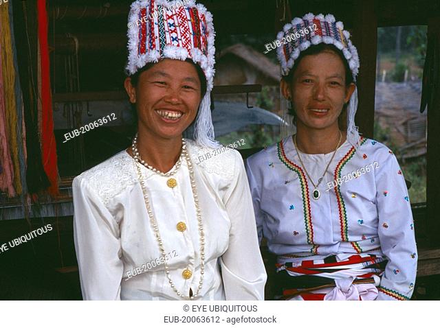 Portrait of two Rawang women at Manou ceremony