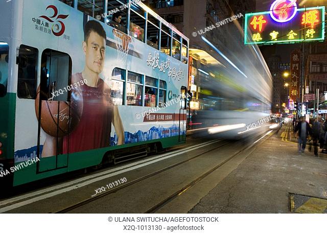 Speeding trams in the Wan Chai district of Hong Kong