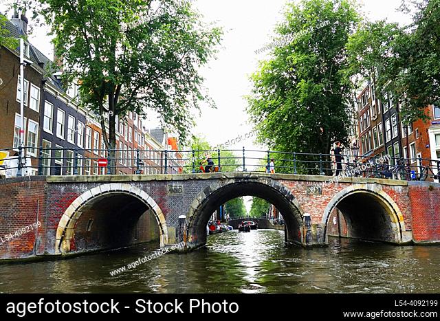 Amsterdam Holland Netherlands city of beautiful buildings bicycles canals streets and bridges and night life