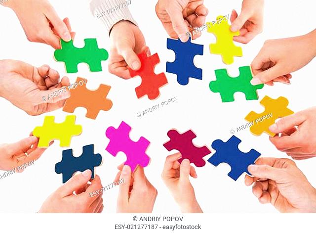 Five People Hand With Puzzle