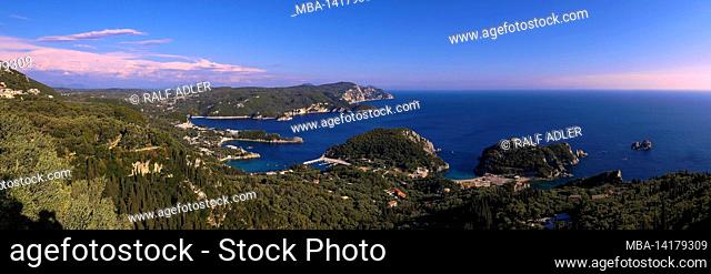Greece, Greek Islands, Ionian Islands, Corfu, northwest, Paleokastritsa, view down to the coastline and the bays at Paleokastritsa, panorama photo