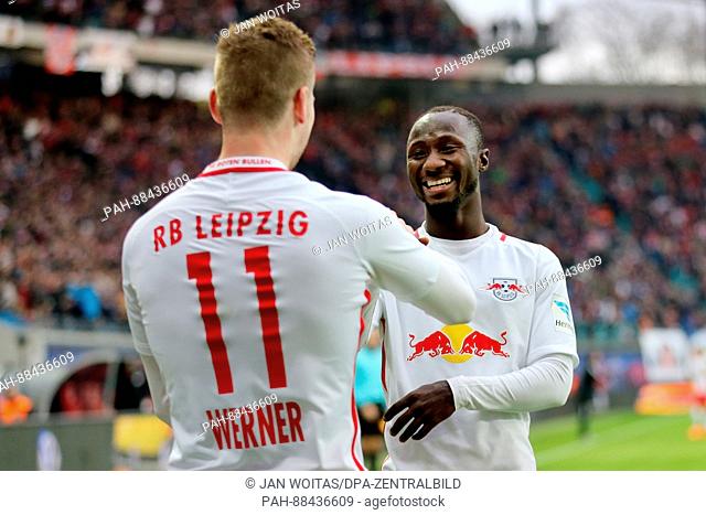 Leipzig's Timo Werner (L) celebrates his 3-1 goal with Naby Deco Keita during the German Bundesliga soccer match between RB Leipzig and 1