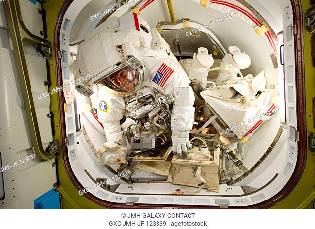 NASA astronauts Rick Mastracchio (left) and Clayton Anderson, both STS-131 mission specialists, attired in their Extravehicular Mobility Unit (EMU) spacesuits