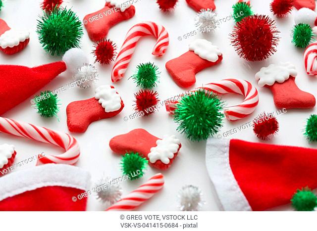 Christmas decoration of santa hats, candy canes and Christmas stockings