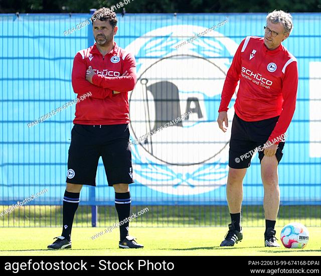 15 June 2022, North Rhine-Westphalia, Bielefeld: Soccer, 2nd Bundesliga, Arminia Bielefeld. New coach Ulrich Massimo ""Uli"" Forte (l) stands next to his...