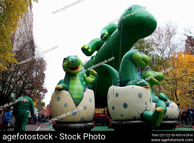 22 November 2023, USA, New York: Giant helium balloons are prepared for the annual Thanksgiving parade in Central Park in Manhattan during the traditional...