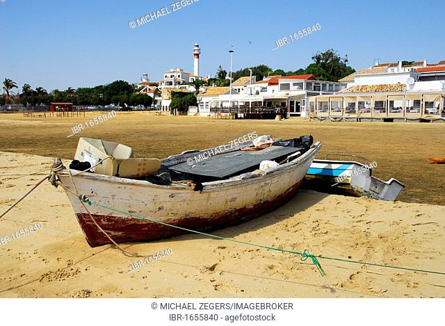 Boat at the beach in El Rompido, low tide, Cartaya, Costa de la Luz, Huelva region, Andalucia, Spain, Europe