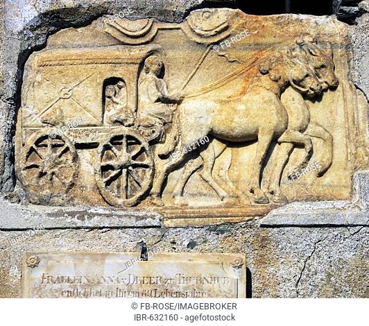 Image of a horse and carriage ferrying the soul to the underworld on a gravestone at a pilgrimage church in Carinthia, Austria, Europe