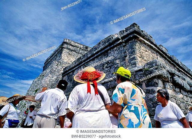 tourist group visiting the Mayan place Tulum, Mexico, Yucatan