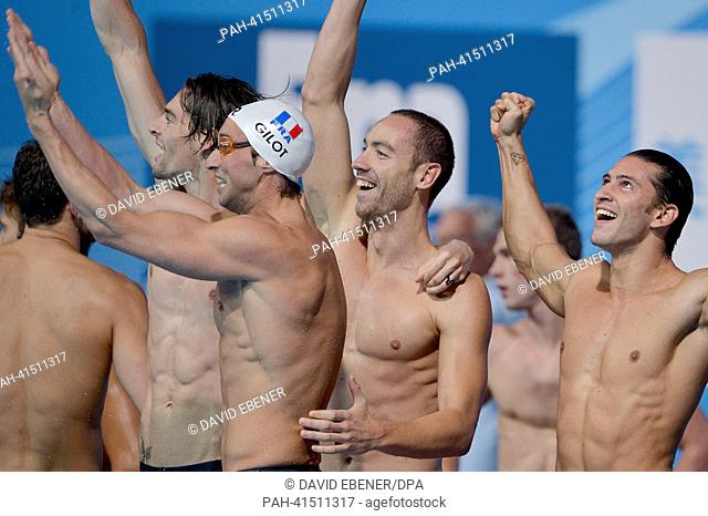 Camille Lacourt (2-L), Jeremy Stravius (2-R) Giacomo Perez D'ortona (R) and Fabien Gilot (3-L) of France celebrate after winning the men's 4x100m Medley relay...