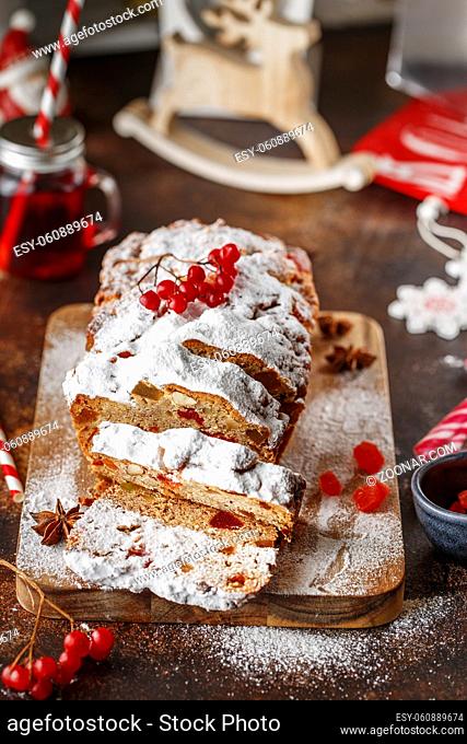 Stollen is fruit bread of nuts, spices, dried or candied fruit, coated with powdered sugar. It is traditional German bread eaten during the Christmas season