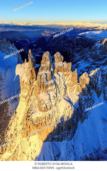 Aerial view of Catinaccio Group and Vajolet Towers at sunset. Sciliar Natural Park Dolomites Trentino Alto Adige Italy Europe