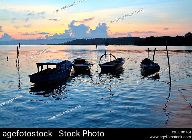 Sunrise at Buntal Fishing Village and Small fishing boats, kuching, Sarawak, malaysia