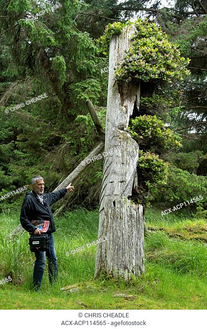 Old Totem ploes at Skedans, Gwaii Haanas National Park Reserve and Haida Heritage Site, Haida Gwaii, formerly known as Queen Charlotte Islands, British Columbia