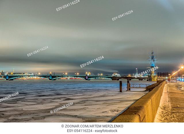 Beatiful night view of the frozen Neva river in Saint Petersburg, Russia