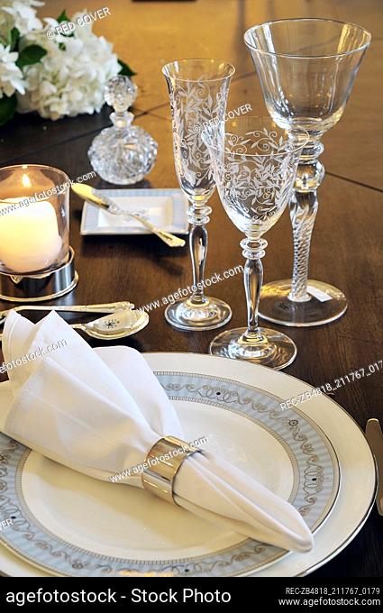 Traditional style place setting with napkin in silver ring