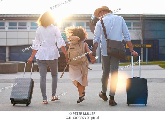 Family of three going on vacation