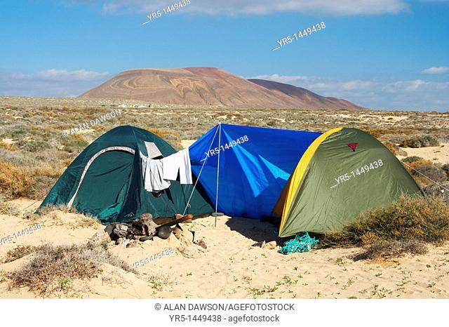 Tents on official beach campsite near Caleta del Sebo on La Graciosa island near Lanzarote in the Canary Islands