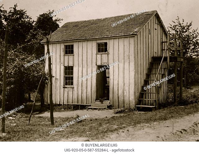Three families live in this shack: one room above and one below. Bottomley's farm near Baltimore, MD 1909