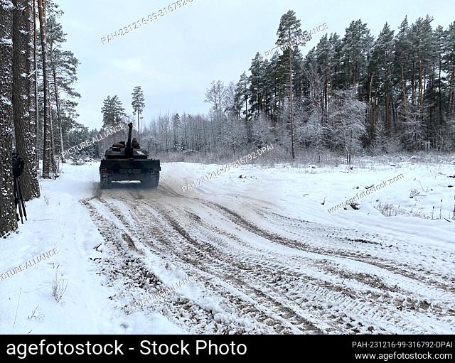 15 December 2023, Lithuania, Rukla: A Leopard 2 A6 tank drives at the Lithuanian Gaiziunai military training area, around 90 kilometers northwest of the capital...
