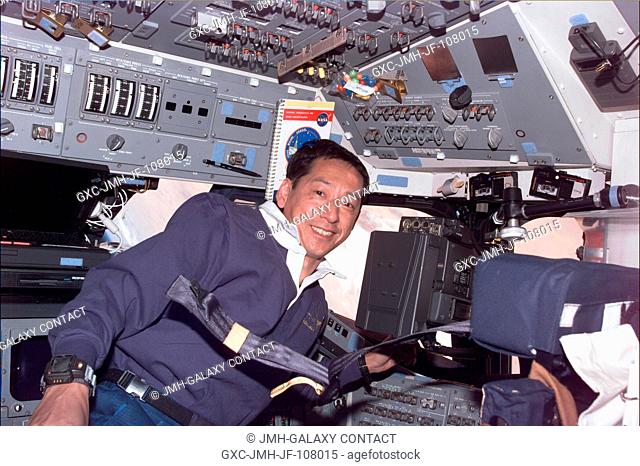 Astronaut Mamoru Mohri is pictured on Endeavour's flight deck during Flight Day 4 of the Shuttle Radar Topography Mission (SRTM)