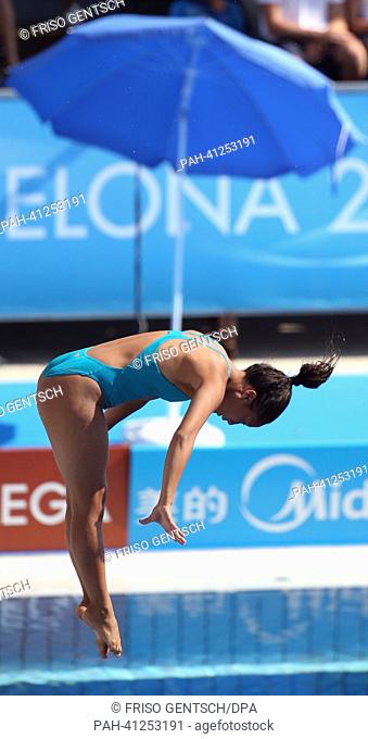 Kieu Duong of Germany in action during the women's 10m platform diving preliminaries of the 15th FINA Swimming World Championships at Montjuic Municipal Pool in...