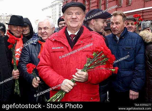 RUSSIA, MOSCOW - DECEMBER 21, 2023: Russian Communist Party Leader Gennady Zyuganov (C) takes part in a flower laying ceremony at Joseph Stalin's grave by the...