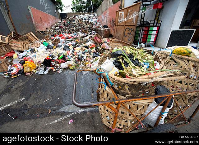 Large pile of rubbish and collection bins in the city, Manggarai district, Jakarta, Java, Indonesia, Asia