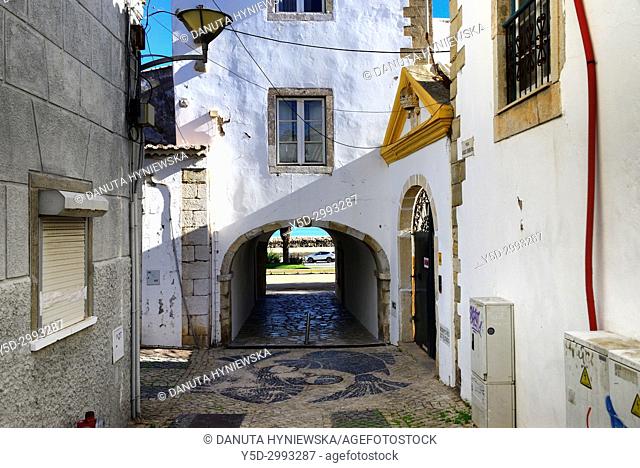 old town of Lagos, here San Goncalo gate - Porta de Sao Goncalo connecting old town with seaside, beaches and river, view from Rua Miguel Bombarda inside...