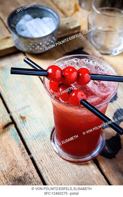A Singapore Sling with cherry liqueur