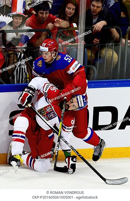 Richard Jarusek of Czech Republic, left, and Alexei Marchenko of Russia in action during the Ice Hockey World Championships Group A match Czech Republic vs...
