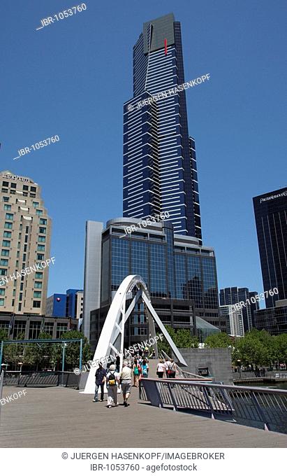 Southbank, pedestrian bridge across Yarra River and Eureka Tower, Melbourne, Victoria, Australia
