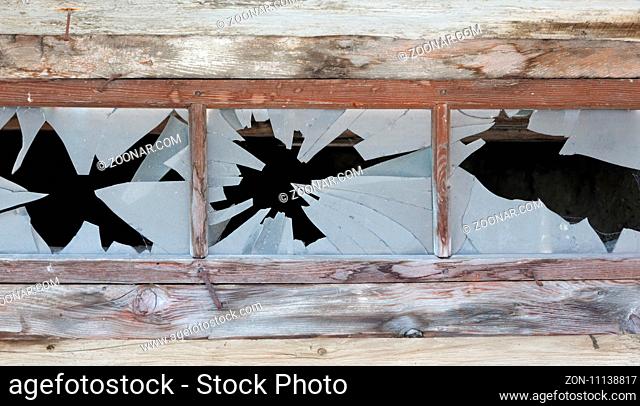 Close up of a broken window, abandoned building in Austria